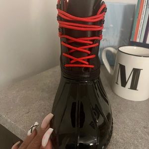 Brand new Tommy Hilfiger rain boots. Size 9 women. Shipping included in price.